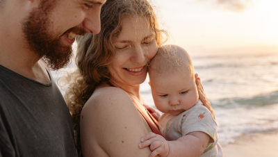 a person holding a baby